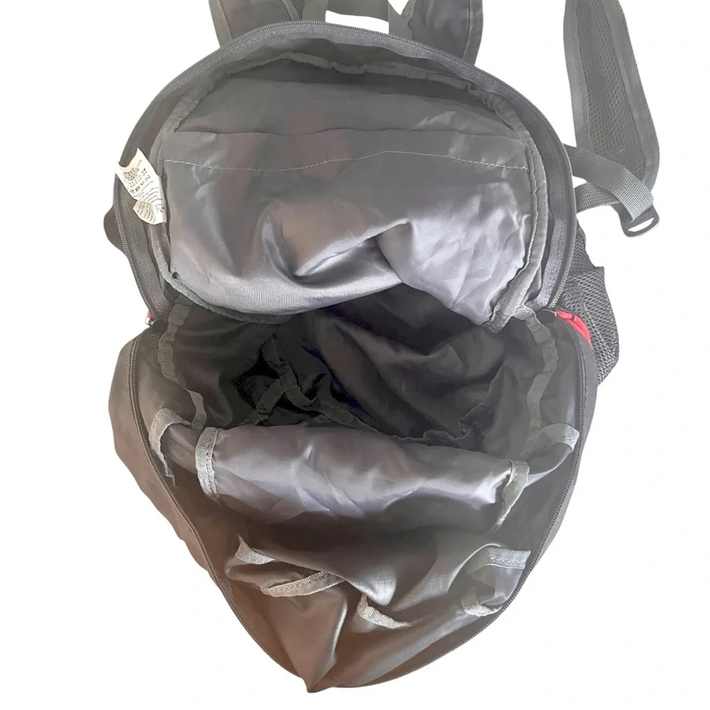 EDDIE BAUER STOWAWAY PACKABLE 20L BACKPACK in black with red piping